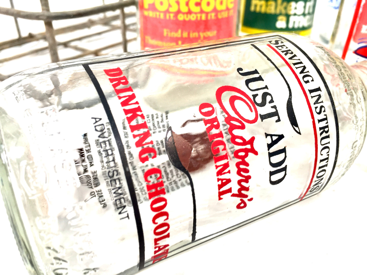 Vintage Advertising - Promotional Glass Milk Bottles in a Wire Basket Carrier