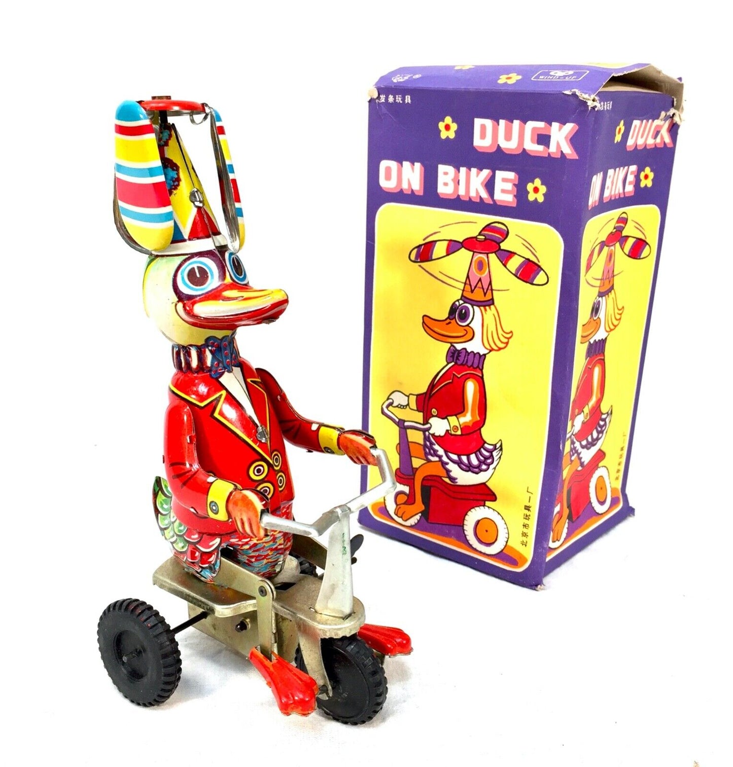 Vintage Wind-up Clockwork Tin Mechanical Wind-Up Duck on a Bike Toy / Boxed